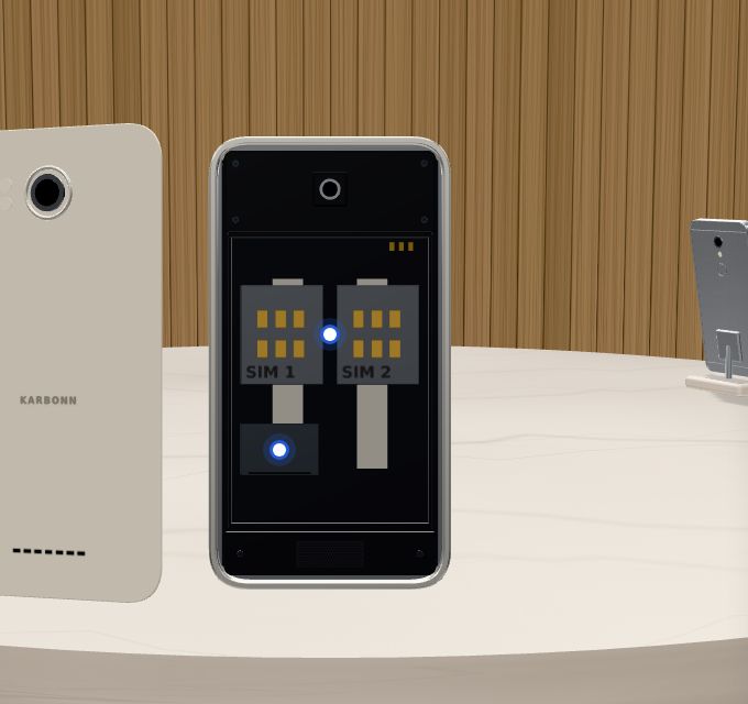 The Karbonn A7 with its battery lifted out, showing two SIM holders and a microSD slot.