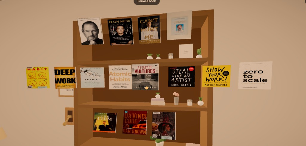 Finished books floating in front of the bookcase: people on top, non-fiction in the middle, fiction on the bottom.